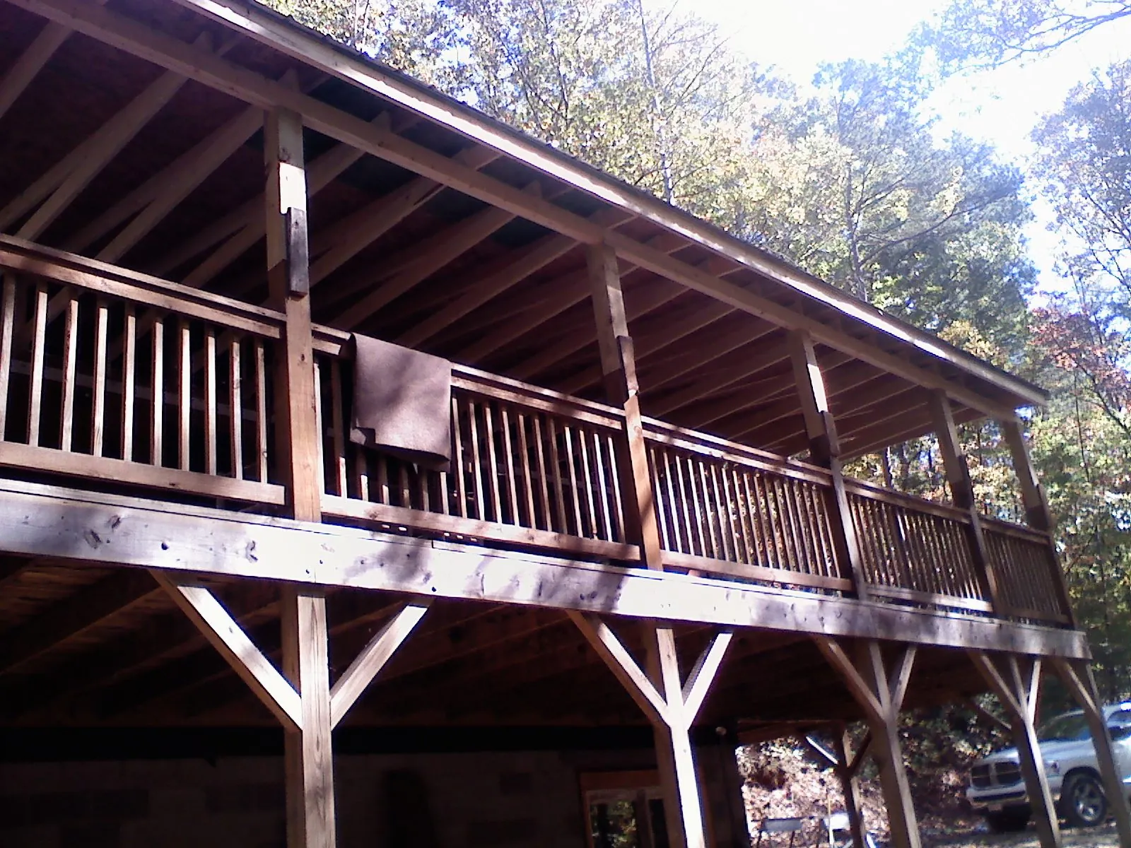 Timber framing under a new elevated porch and deck — Roof Leak Repair in Five Points by Roofing Brothers